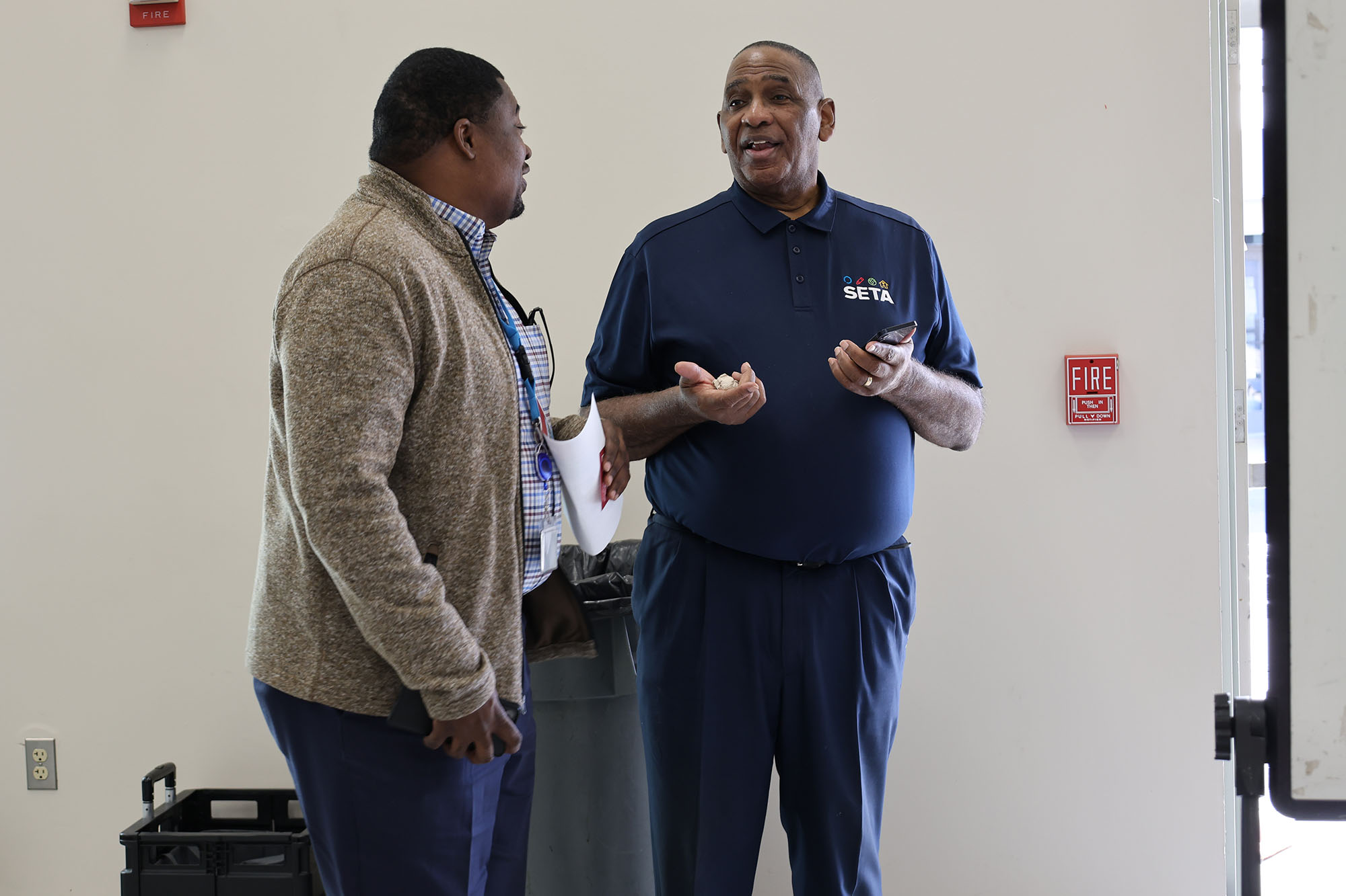 Two men talking
